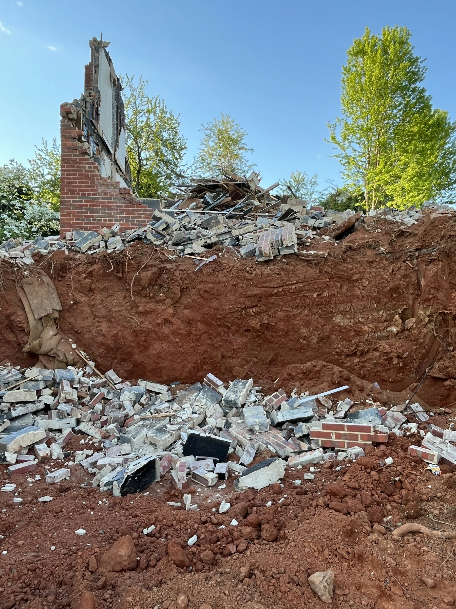 Reclaimed brick and demolition material stacked in a salvage yard